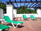 The spacious and sunny roof terrace
